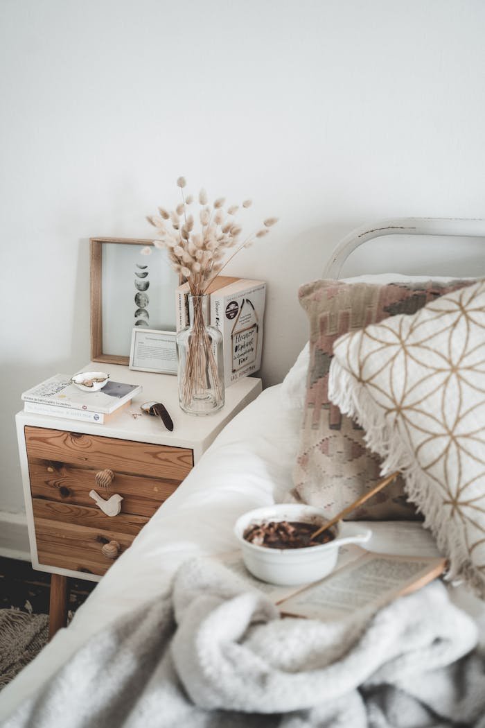 Services Stylish Scandi bedroom with breakfast setup, ideal for cozy home living.